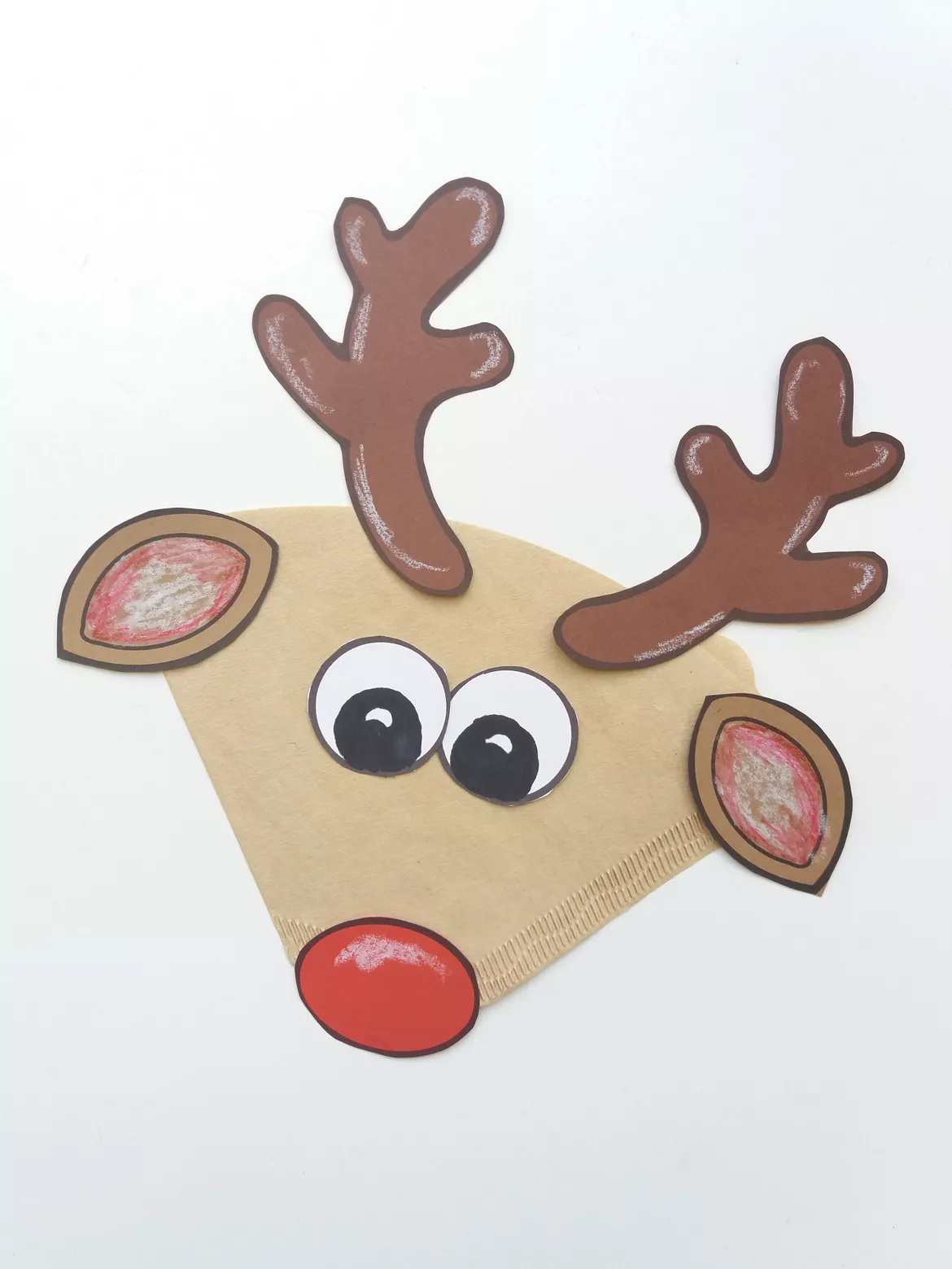 Bild in der Beschreibung des Unterrichtsmaterials Rentier aus Kaffeefilter basteln Weihnachten Adventskalender Winter von Wolkenland.Graphics #1